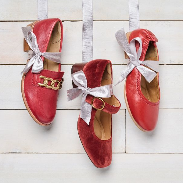 Featuring the Nevara, Laura and Kenni loafers in red hanging by silver ribbon.